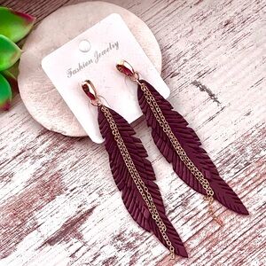 Burgundy/Maroon leather feather 4” long earrings with gold chain
